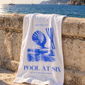 Lifestyle | Pool at Six Beach Towel on a stone wall above the sea